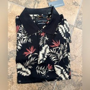 Greg Norman short sleeved shirt.